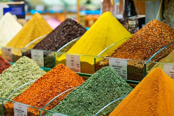 Various bright colored powder spices on market in Istanbul, Turkey.