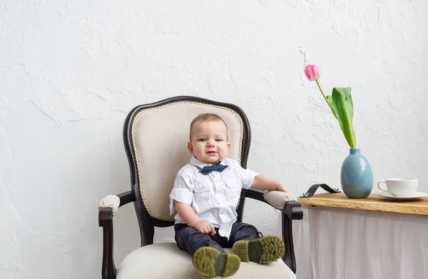 Fashionable Baby Boy Sitting Armchair White Room Horizontal Portrait — Stock Photo, Image