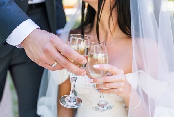 Wedding Couple Toast. The champagne glasses. Closeup photo