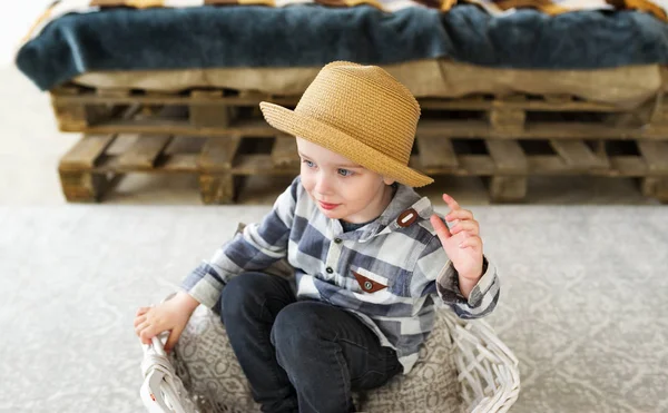Cute Little Boy Straw Hat Sitting Big Basket Bedroom Closeup — Stock Photo, Image