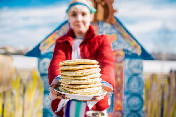 Stack of russian pancakes. The concept of Russian holiday Maslenitsa, Shrovetide. Selective fokus in pancake