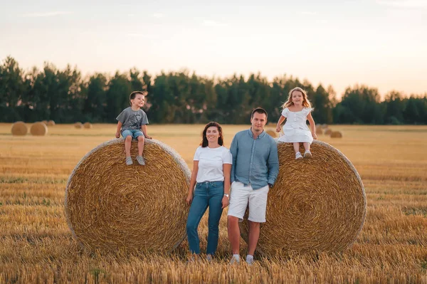 Family Four Have Rest Haystack Wheat Field Summer Sunset Time — Stock Photo, Image