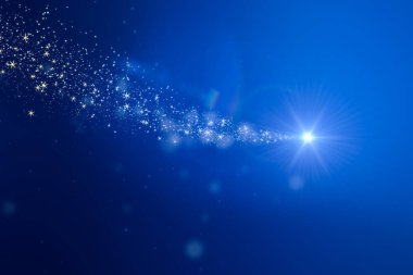 Noel ışık parçacıkları bokeh mavi arka plan üzerinde - tatil kavramı