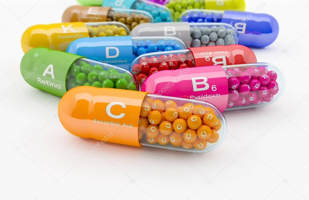 3d rendering of many vitamin capsule