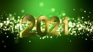 Noel 'in video animasyonu altın ışık parçacıkları yeşil zemin üzerine parlıyor ve 2021 rakamları yeni yılı temsil ediyor - tatil kavramını.