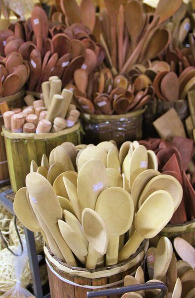 Closeup view  of wooden spoons in the shop