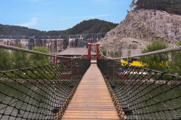 Suspension Bridge in the Hengdian Film and Television City, in Zhejiang Province, China.