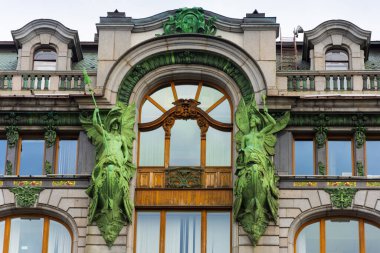 Details of the facade of the Zinger house on Nevsky Prospekt in St. Petersburg, Russia clipart