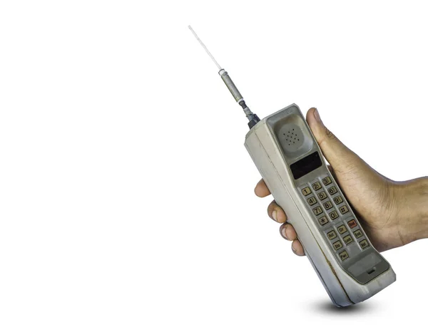 Beyaz arka plan üzerinde izole rustik vintage cep telefonunuzu kapatın