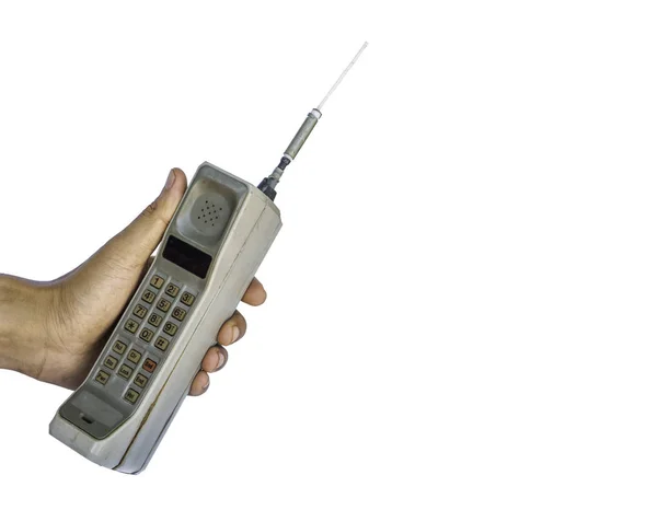 Beyaz arka plan üzerinde izole rustik vintage cep telefonunuzu kapatın