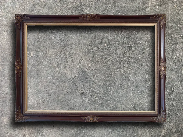 Rustic picture frame on cement wall — Stock Photo, Image