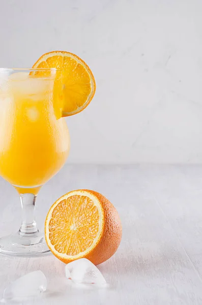 Fresh Yellow Oranges Cocktail Elegance Wineglass Ice Cubes Straw Half — Stock Photo, Image