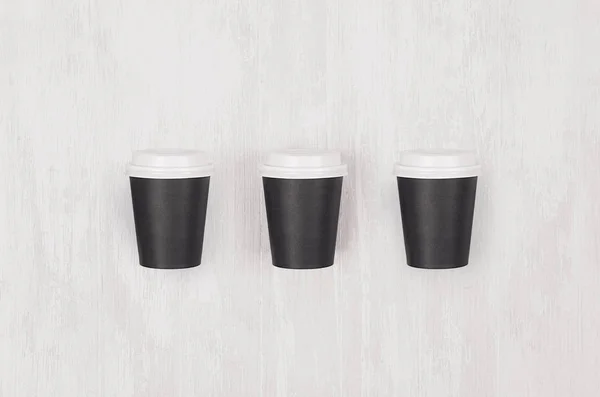 Maqueta Café Conjunto Tres Pequeñas Tazas Papel Negro Blanco Con — Foto de Stock