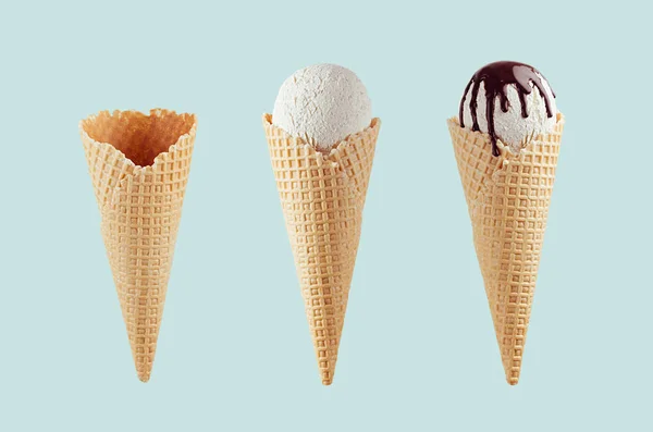 Set of different ice cream cones in waffle cone - empty, white ice cream, with chocolate sauce on  green background.