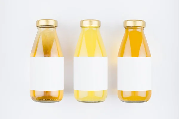 Verzameling Van Verse Vruchtensappen Geel Oranje Modderig Transparant Glazen Flessen — Stockfoto