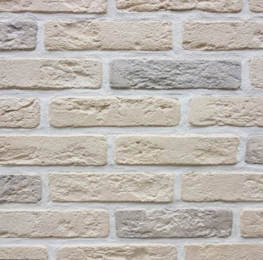 Beyaz damarlı açık kahverengi tuğla duvar. arka plan ve doku. Boşluğu kopyala.