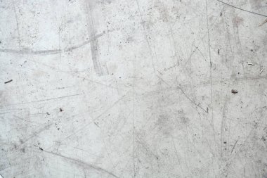 Beton zeminin arkaplanı, yerdeki toprak parçacıkları, depo.