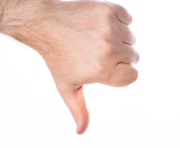 白い背景に親指で男性の手のクローズアップ 失望の不承認の概念 モックアップ — ストック写真