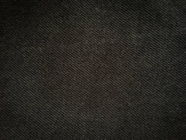 Tasarım için kopyalama alanı olan siyah kot dokusu arkaplanı