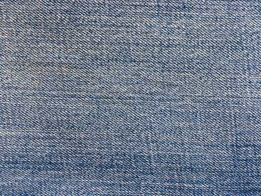 Tasarım için kopyalama alanı olan mavi kot kumaş arka plan