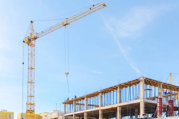 View of the construction site. Tower crane at a construction site. Monolithic frame of the building — Stock Image View Construction Site Tower Crane Construction Site Monolithic Frame Building Royalty Free Stock Images