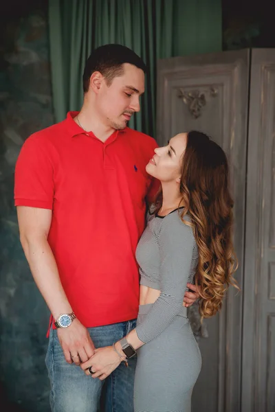 Young Couple Hugging Home — Stock Photo, Image