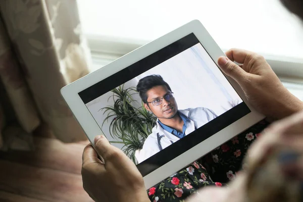 online consultation with doctor on digital tablet
