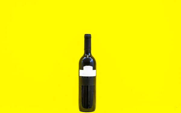 Red Wine Bottle Whtie Blank Label Yellow Background — Stock Photo, Image