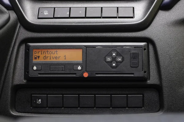 Digital tachograph display reads Printout Driver 1. No personal data. Tachograph in a van — Stock Photo, Image