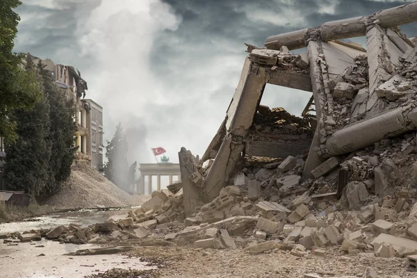 View on a collapsed concrete industrial building with German Brandenburg gate behind and Turkish flag above. Dark dramatic sky above. Damaged house. Scene full of debris. — Stock Photo, Image