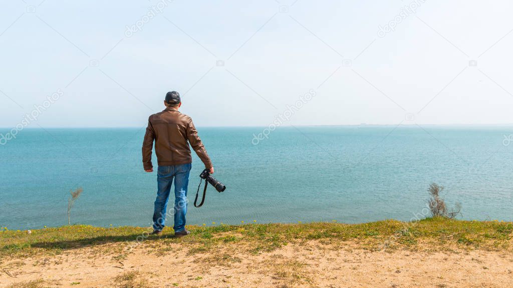 Nature photographer by the sea