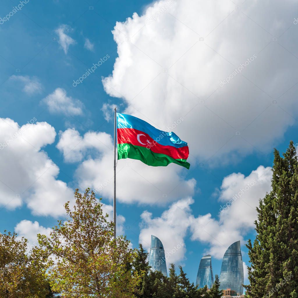 Flag of Azerbaijan against the blue sky