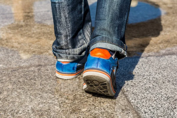 Old leather sneakers, steps