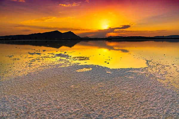 Bright colorful sunset on a salt lake