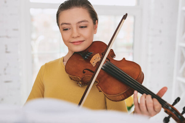 Portrait of delighted girl that having rehearsal
