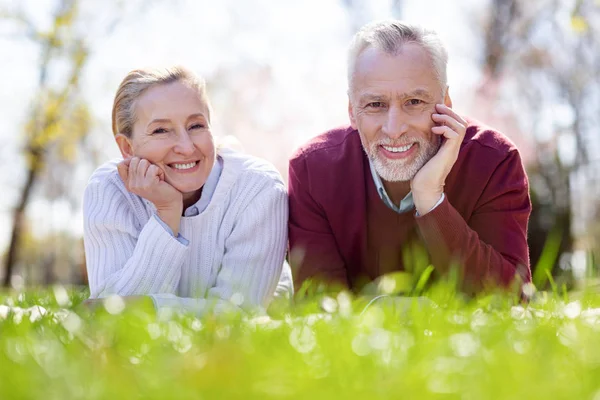 Nice delighted couple looking at you — Stock Photo, Image