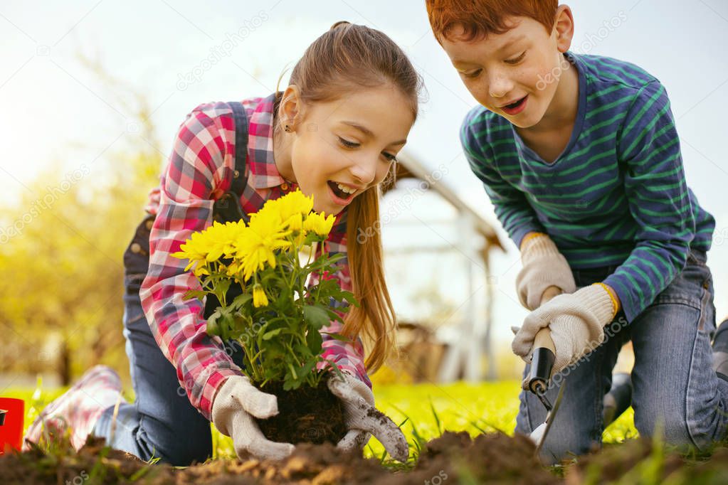 Nice positive girl holding flowers