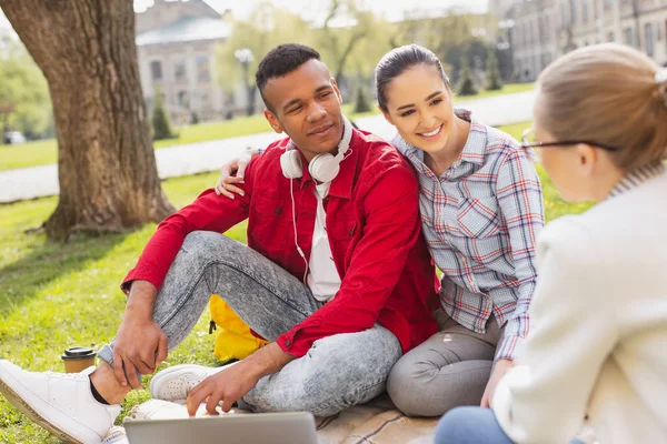 Couple of lovely students spending time together — Stock Photo, Image