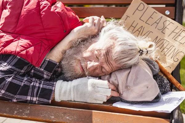 Nice homeless man having nowhere to live — Stock Photo, Image