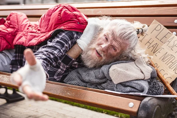 Cheerless poor man asking for help — Stock Photo, Image