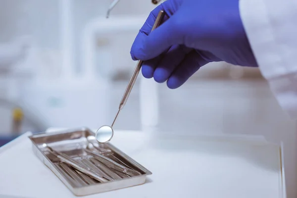 Close up of male hand that being in sterile gloves — Stock Photo, Image