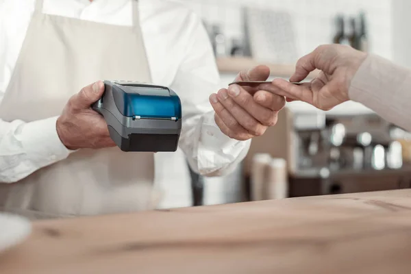 Close up of terminal that being in male hands — Stock Photo, Image