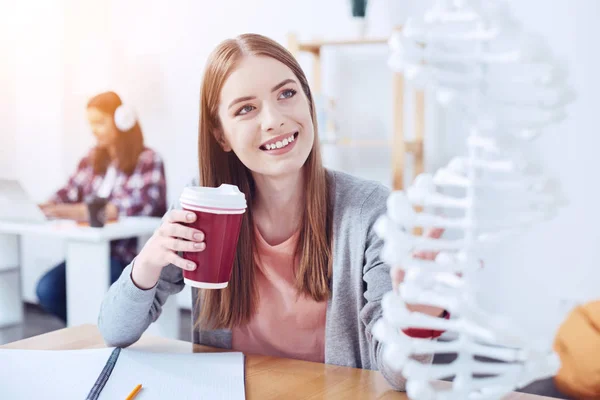 Positive delighted girl going to drink tea — Stock Photo, Image