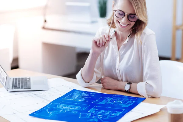 Joyful happy woman working on a project — Stock Photo, Image