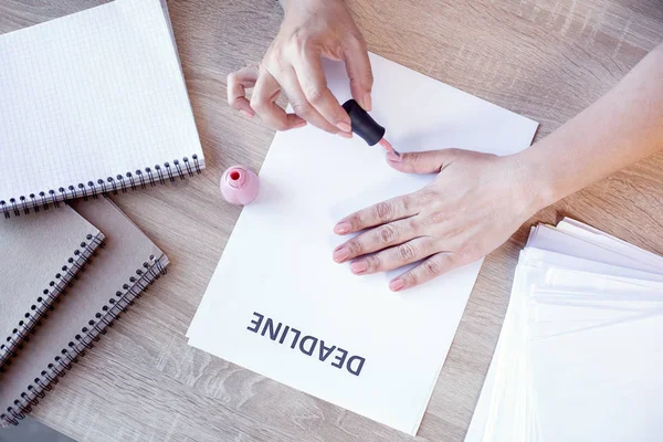 Beautiful female hands coloring nails — Stock Photo, Image