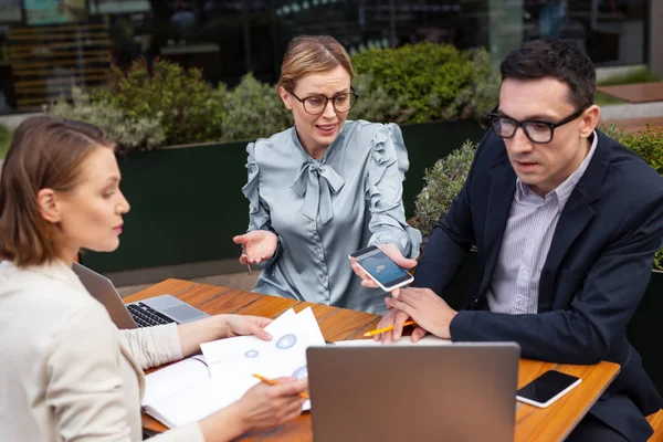 Prosperous businesswoman feeling shocked after deal results