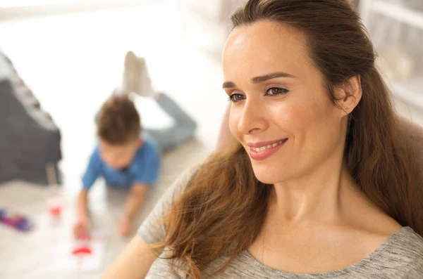 Beautiful green-eyed woman thinking about future