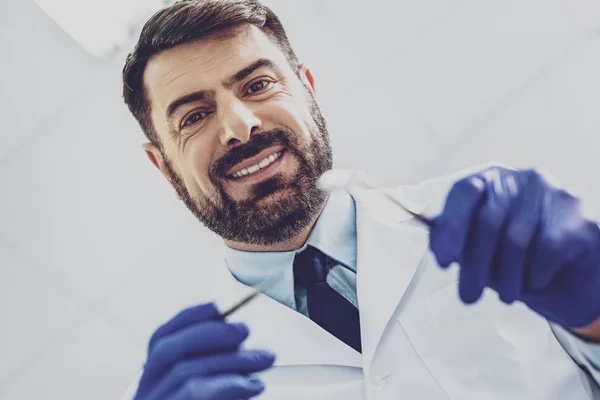 Delighted bearded man looking at camera — Stock Photo, Image