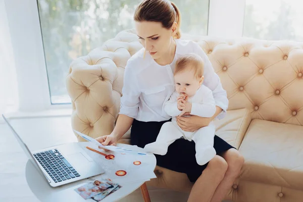 Attentive female person checking documents — Stock Photo, Image