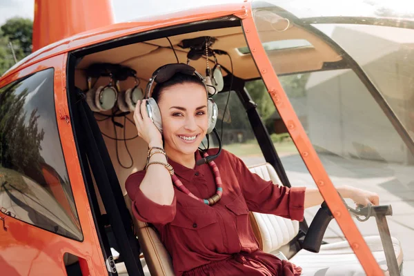 Happy optimistic woman training flight — Stock Photo, Image